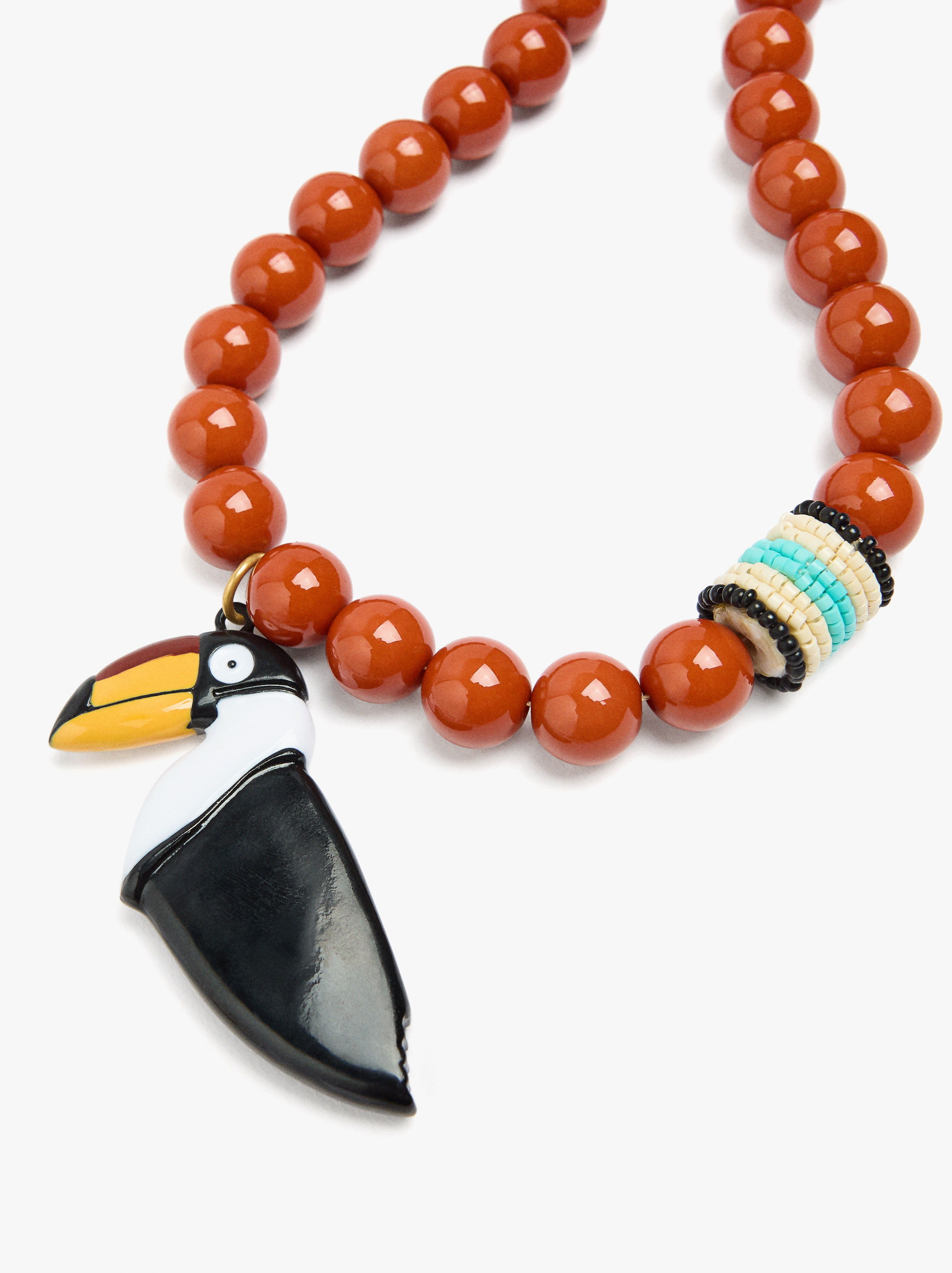 Kort halsband med fågelpendel