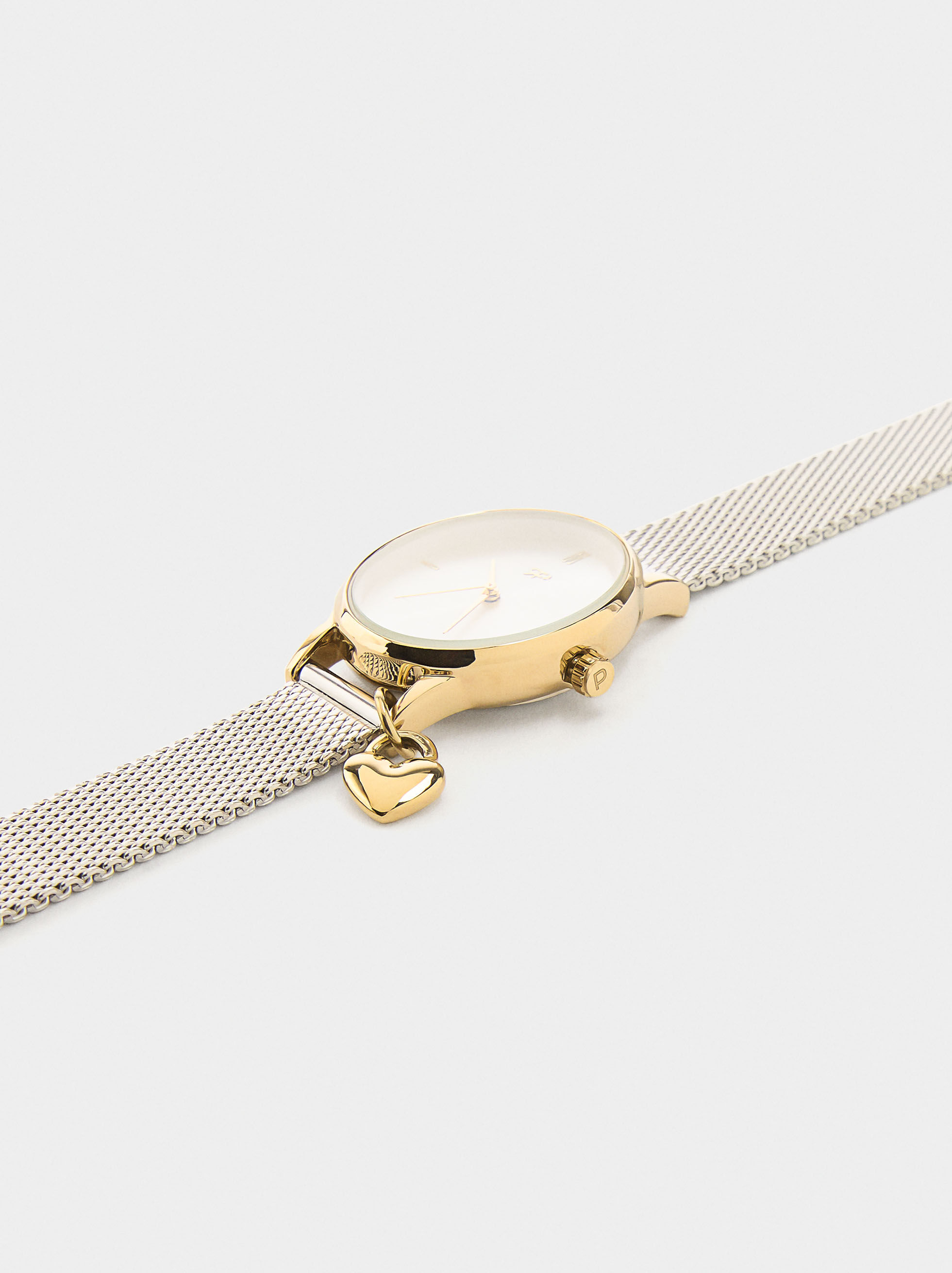 Metallfjädrad armbandsur med charm